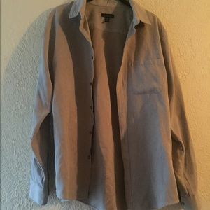 Gray suede button up shirt.